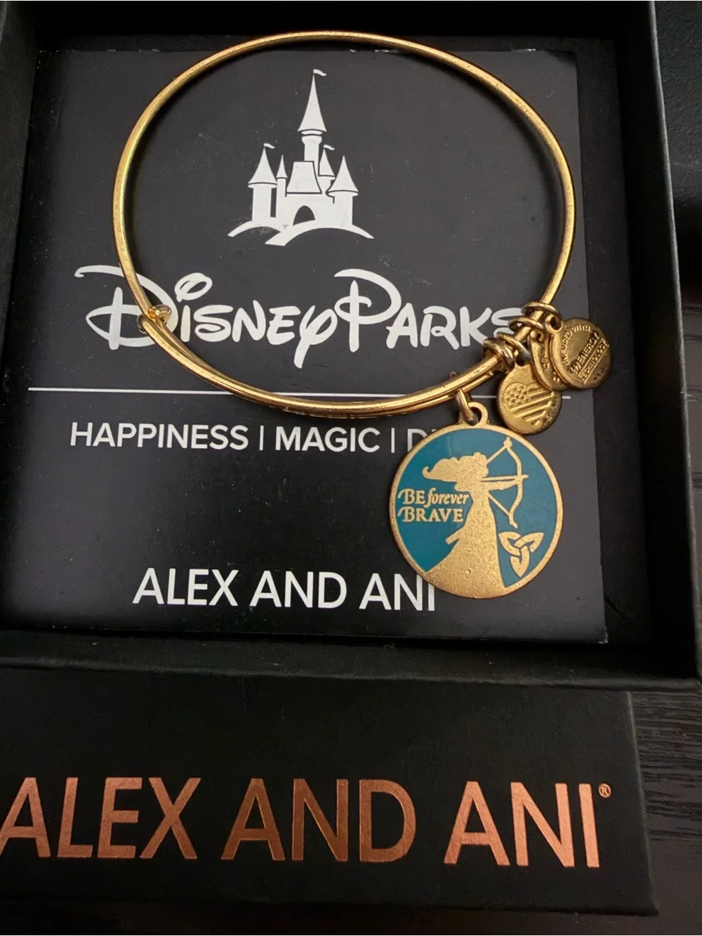 Alex and Ani Gold Tone Bangle with Teal Brave Charm